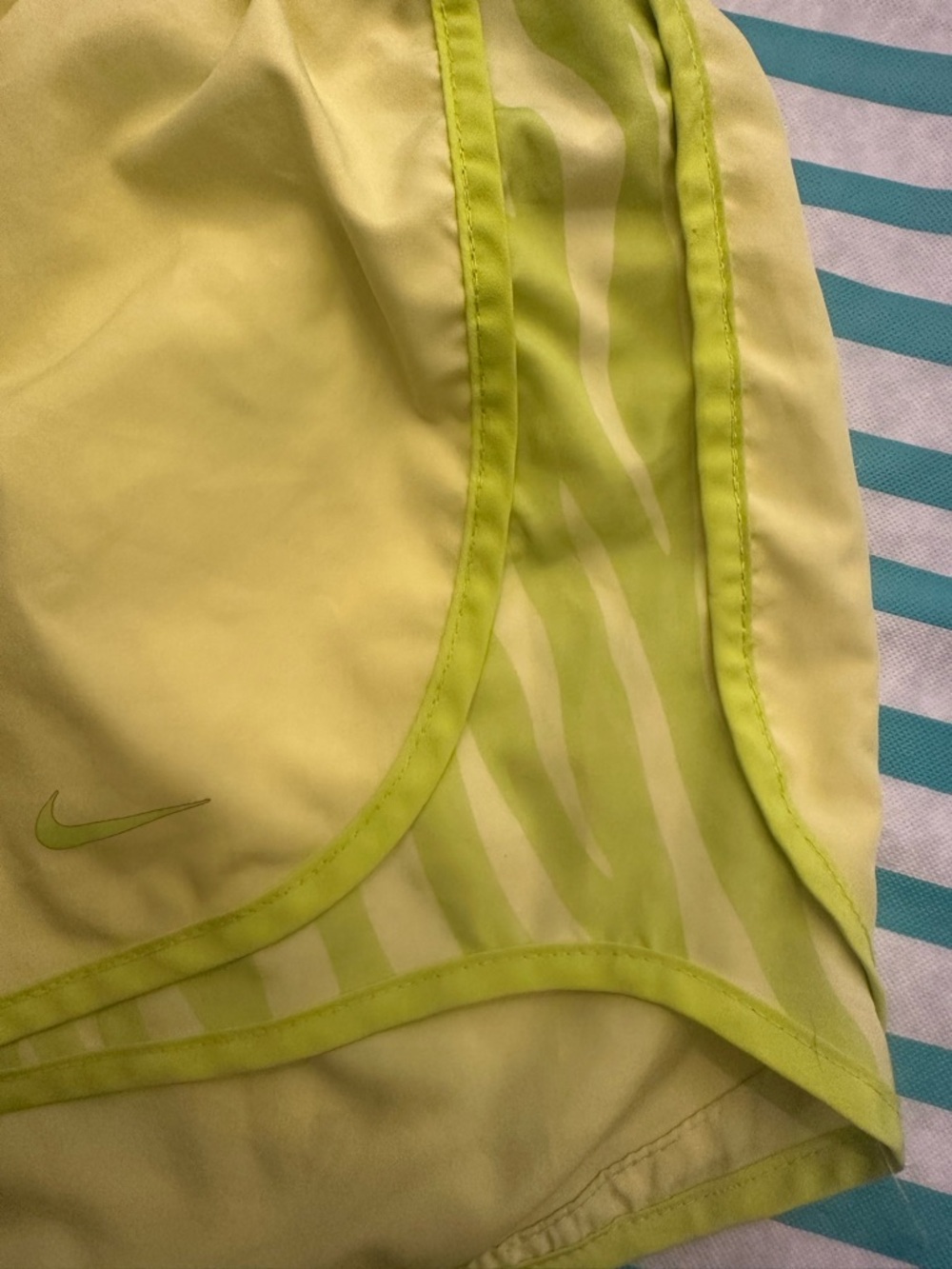 Nike Women’s small Green and Yellow dri fit Running Shorts